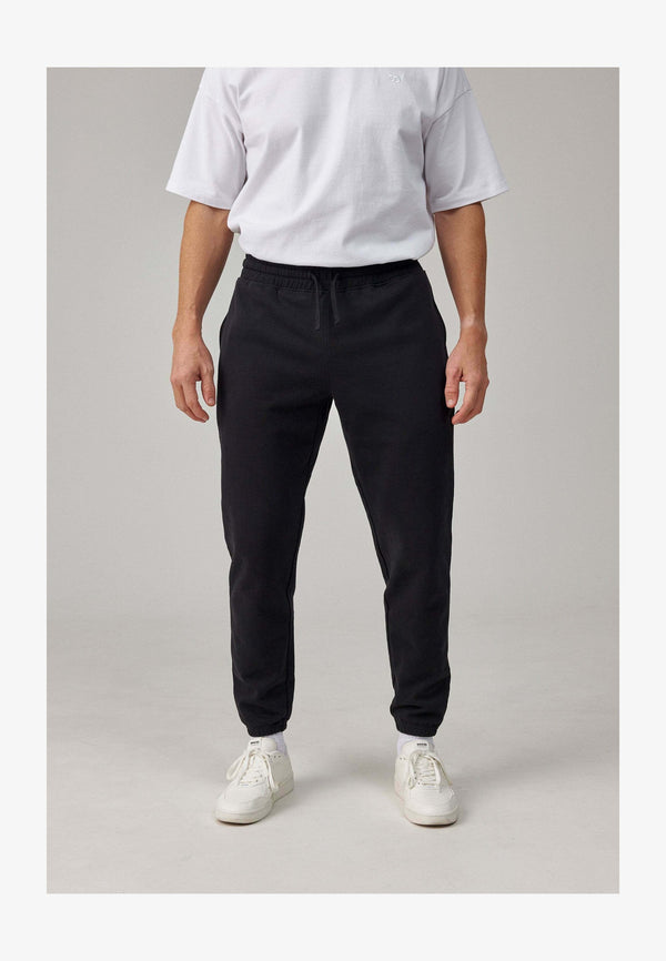 Pantalon de survêtement - schwarz